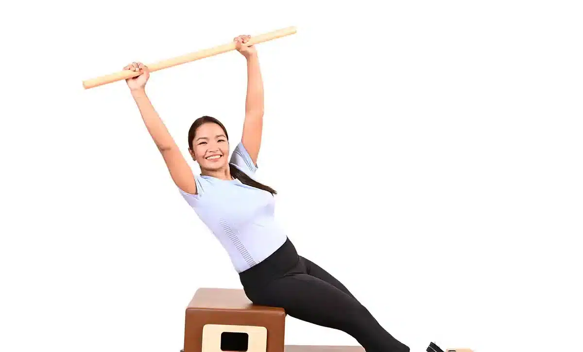All core pilates trainer on reformer